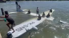 Cesna light aircraft carrying 13 passengers crashes into ocean in Indonesia