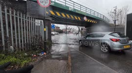 Storm Chandra: Cars edge through bridge in Birmingham