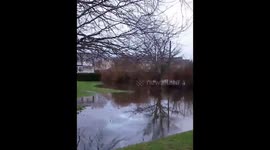 Storm Chandra Unleashes Flood Fury as River Bovey Bursts Its Banks in Devon
