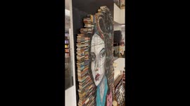 Stunning portrait made from hundreds of stacked books