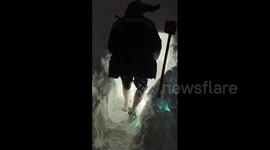Russia: Residents in Russia forced to dig snow tunnels to reach their homes after blizzard