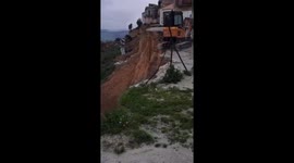 Italy landslide forces thousands to flee as homes hang on cliff edge
