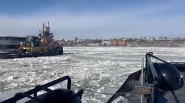 Coast Guard breaks ice to free NYPD vessel on Hudson River