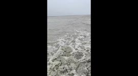 Teachers brave raging lahar waters while returning home in Botolan, Zambales, Philippines