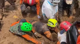 Search for dozens missing continues as death toll rises to 38 in Indonesia landslide