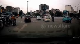 Car wheel comes loose on road during rush hour traffic in Vietnam