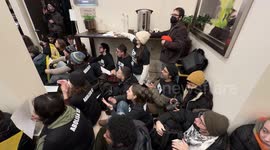 Activists gather in NYC hotel lobby to protest ICE ties