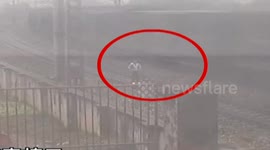 Students wait for train on railway and runs away right on time