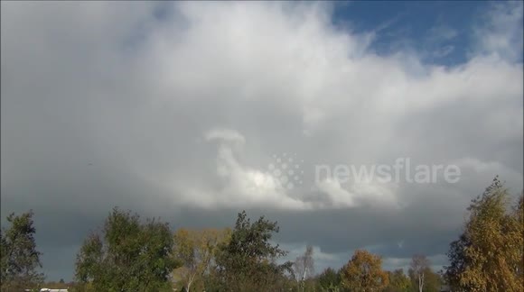 Stunning timelapse of a rainbow among Cumulonimbus clouds
