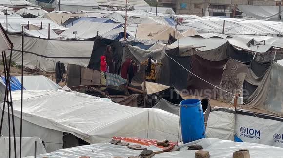 Heavy rains flood roads and displaced Palestinians’ tents in Gaza - Buy ...