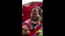 Esmé at 13months old excited by hairdryer