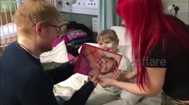 Ed Sheeran visits children's ward to serenade nine-year-old fan with rare brain condition