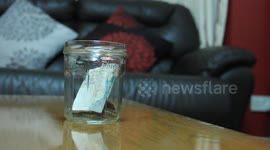 Dropping change into a jar