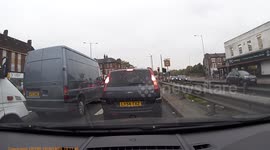 Driver on the phone as he drives