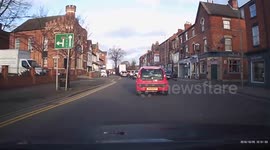 Man on mobility scooter almost hit by car