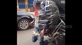 Man tied to back of car on his wedding day