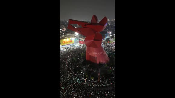 Mexico fans celebrate at iconic landmark after World Cup win over