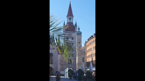 Historic Charm: The Old Town Hall Tower and St. Peter's Church in