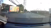 The clip that became a meme! Motorcycle rider almost crashes into car, apologises.... then rides into ditch
