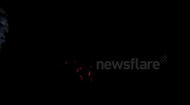 Policeman piss to put out a fire