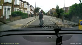 Drunk pedestrian crossing the road. Near miss.