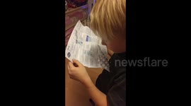 Little sister thinks she found the Nemo book instructions so gets big brother to read them to her ...