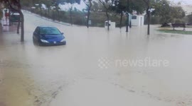 Newsflare Edit - Car gets caught in major flooding in Costa Del Sol