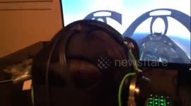 Woman tries to brave her fear of flying using VR headset and simulation game