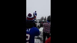 Buffalo Bills fan breaks his leg jumping off car at tailgate party