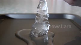 TV astronomer demonstrates how to 'super cool' water to make an ice tower