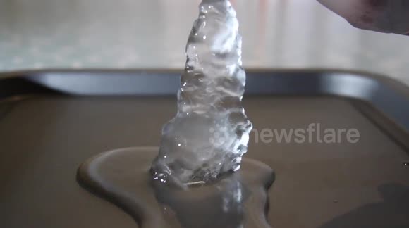 TV astronomer demonstrates how to 'super cool' water to make an ice tower