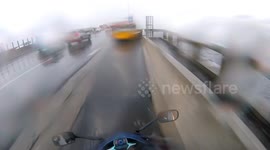 Motorcycle in the flood in Rio de Janeiro