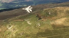 Tornado jet passes through rainbow