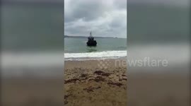 Marines Dressed As Santa And Jesus Arrive On Cornish Beach On Boat 