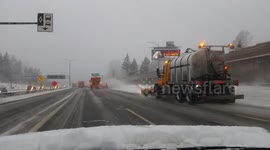 Trucks plowing snow in Vancouver 