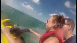 Falling off back of jet ski when wife driving.