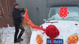 Security guards create 'snow convertible’ in northern China