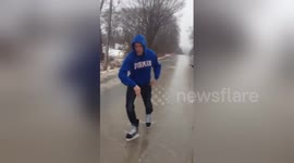 Canadians make the most of the cold weather and ice skate on roads