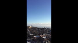SeaSmoke and visible Lake Freezing over Lake Michigan