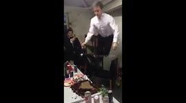 Man faceplant into cake at Christmas party