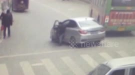 Driver slows runaway vehicle – by dragging his feet in China