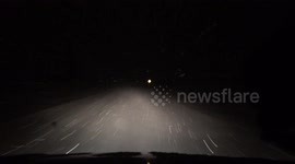 Driver can barely see road after fresh snowfall