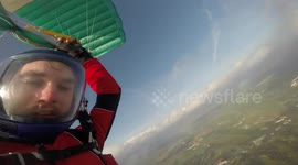 Skydiver drops GoPro, then catches it with his legs 3,000 ft in the air