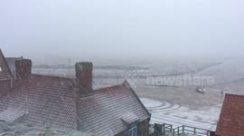 Wind and snow arrive in Blakeney, Norfolk.