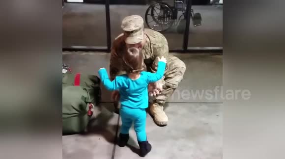 Newsflare Edit - Baby girl welcomes home daddy after deployment