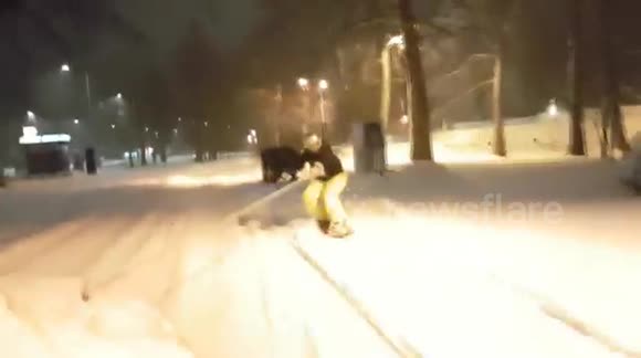 Snowboarding on the snow-filled streets of Bulgaria