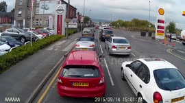 insecure load  on a white van, ladders fall from the vans roof