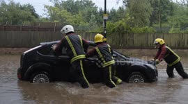 Fire Brigade rescue stranded motorist in flooding in Birmingham