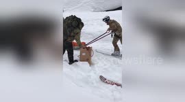 Newsflare Edit - The military helping inhabitants reach the helicopter