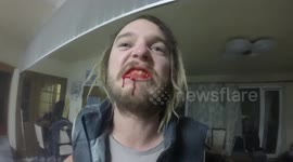 Man falls and breaks table while playing 'the floor is lava'